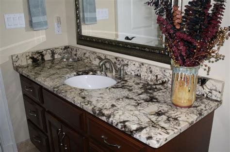 You can also look for ice brown granite and alaska. Delicatus White granite.... looks beautiful in this ...
