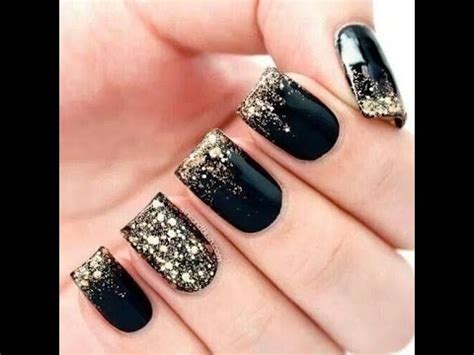 Rose nail designs are becoming quite popular, and these roses on the tips of the nails and between baby blue stripes are sweet and feminine. Gold Black Nail art designs - YouTube