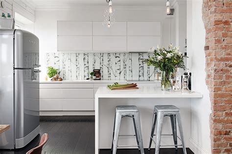 These kitchens generally have an all white theme with a design that allows a lot of natural light and space inside. Nordic Apartment Enhanced By Its Eclectic Decor