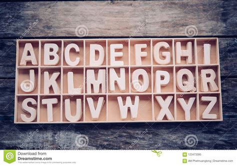 English Letters Are Placed In A Wooden Box In Alphabetical Order Stock Image Image Of