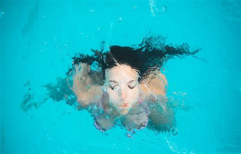 Woman In The Water By Stocksy Contributor Simone Wave Stocksy