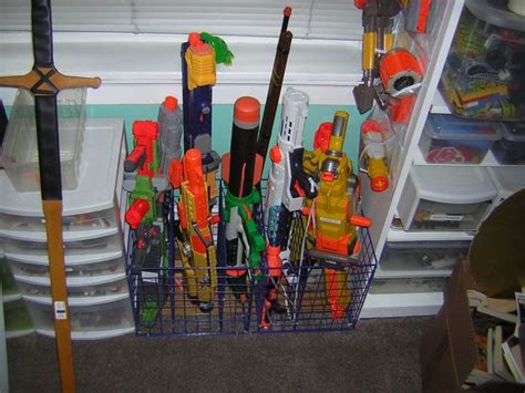 Get those builky plastic guns off the floor with the easy diy nerf gun storage idea! Nerf storage ideas