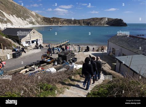 Lulworth Cove Is A Cove Near The Village Of West Lulworth On The