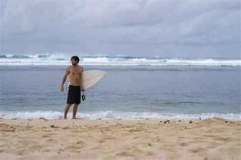 Premium Photo Sexy Surfer Surfing Man With Surfboard Handsome Young Male Athlete Holding Surf