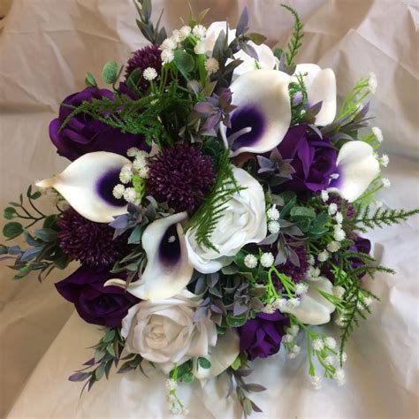 A Wedding Bouquet Of Ivory And Purple Silk Flowers Purple Wedding