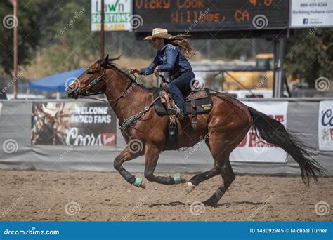 Full Gallop Editorial Image Image Of Tight Cowgirl 148092945