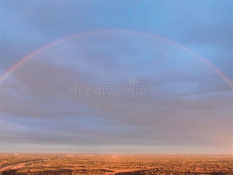 A Rainbow Over The Forest At Sunset From A High Altitude Beautiful