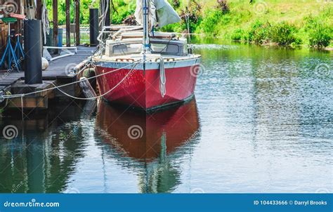 Red Boat Tied To Dock Stock Photo Image Of Wooden House 104433666