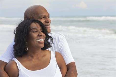 Happy Senior African American Couple On Beach Happy Romantic Senior