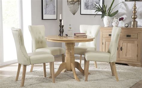 Kingston Round Oak Dining Table With 4 Bewley Ivory Leather Chairs