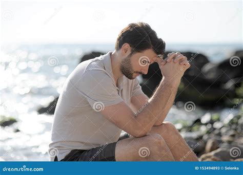 Alone Sad Man Sitting On A Beach Stock Image Image Of Meditative