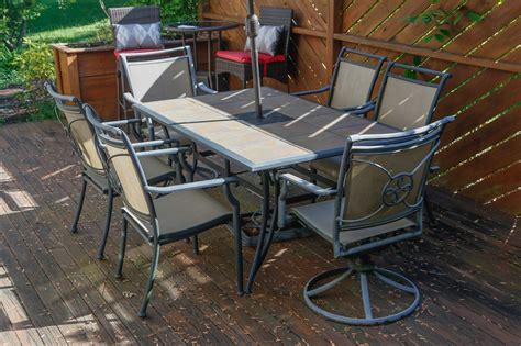 Ceramic Tile Top Patio Dining Table And Chairs With Umbrella Ebth