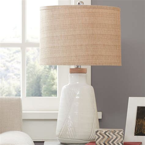 Subtle industrial accents decorate the body of this lamp. Newton 24.5" Table Lamp | Farmhouse table lamps