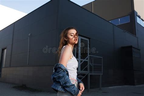 Portrait Of Adorable Brunette Girl Posing At The Urban Street Bu Stock