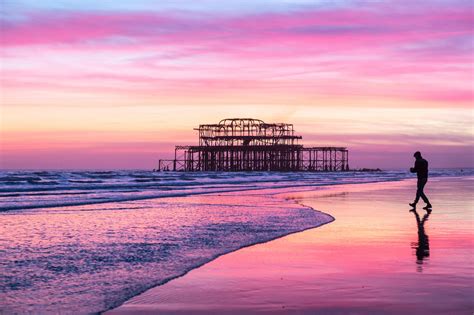 Brightons West Pier At Low Tide And Dusk Brighton Brighton Beach