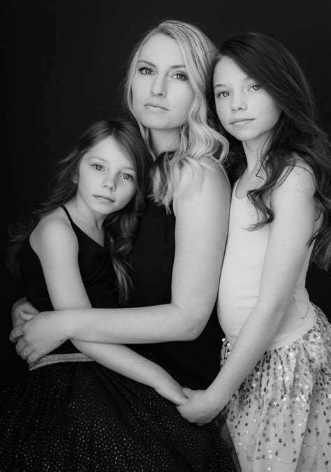 Three Young Women Are Posing For A Black And White Photo With Their Arms Around Each Other