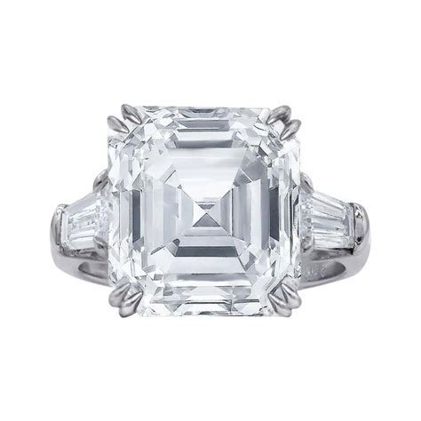 Platinum Engagement Ring With Center Asscher Cut And Tapered Baguettes