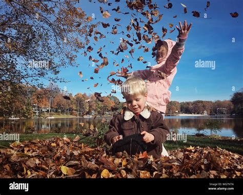 Autumn Children With Girls Fun Outdoors Hi Res Stock Photography And
