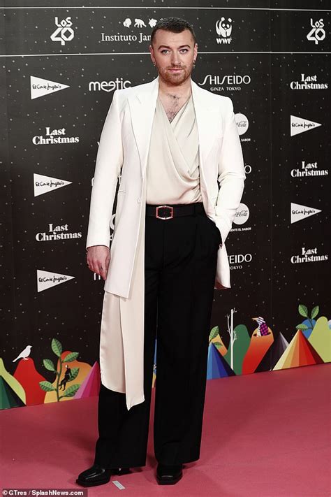 Sam Smith Looks Chic In A Silk Blouse And White Blazer At The 40