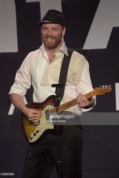Musician Jonny Buckland Of Coldplay Performs Onstage During Amfar La