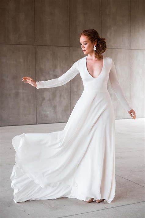 .range of vintage long sleeve lace wedding dress long train, simple long sleeve wedding dresses plus size and plus size long sleeve wedding gowns 2020. Minimalist Crepe Gown with Long Sleeves Deep V neckline ...