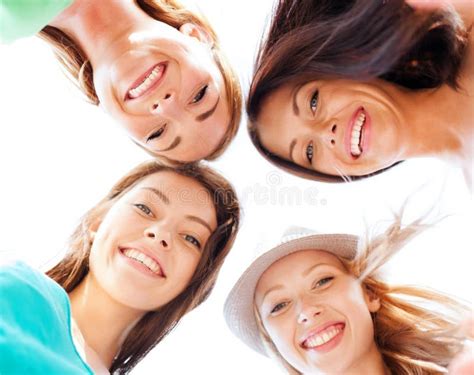 Faces Of Girls Looking Down And Smiling Stock Photography Image 34396282