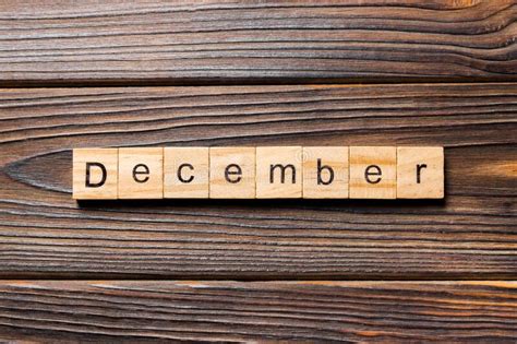 December Word Written On Wood Block December Text On Wooden Table For
