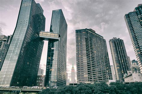 High Rise Buildings Under Cloudy Sky · Free Stock Photo