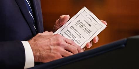 Photos Show Biden Cheat Sheets During First Formal Press Conference