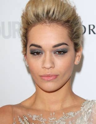 Papanikolas warns against going too dark — you want them to look fierce, not harsh. Celebrities with Blond Hair and Dark Eyebrows|