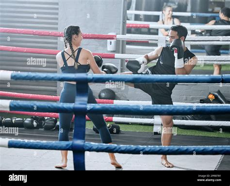 Fit Healthy And Active Woman Doing Kick Boxing Workout In The Gym
