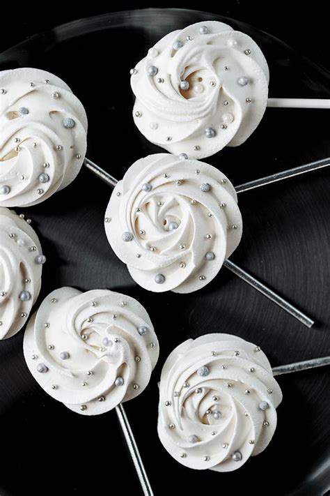 Ordered these meringue cookies and had it customized for a baby shower. Wintry Meringue Pops | Meringue desserts, Meringue ...