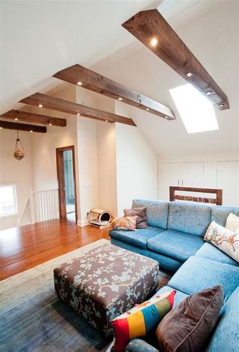 Textured beams break up a flat ceiling and add interest to the décor. Living Rooms With Beams That Will Inspire