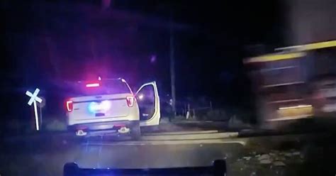 Officers Charged After Train Hits Police Car With Handcuffed Woman Inside All In One 24x7