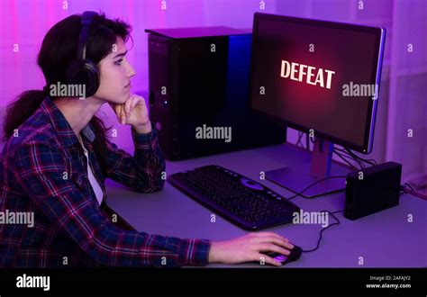 Sad Gamer Lost Game Playing Online On Computer Stock Photo Alamy