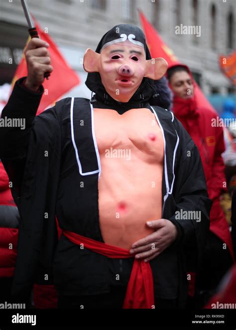 Performers Taking Part In A Parade Involving Costumes Lion Dances And Floats For London S