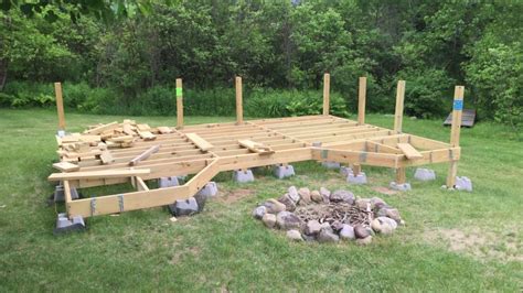 The ground is wavy and needs to be lefeled but the ground is solid as a rock. How I Built My Floating Deck on Uneven Ground. | Building a floating deck, Floating deck ...
