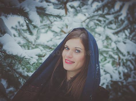 Russian Beautiful Girl Near The Christmas Tree In The Woods Lit By Candles Stock Image Image