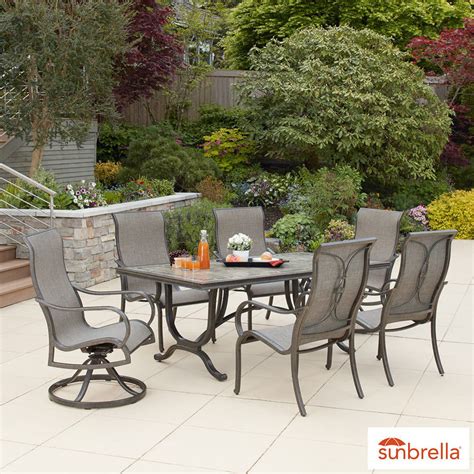 Cosco outdoor living dining table with glass table top and umbrella hole, black wicker. Agio Montgomery 7 Piece Sling Dining Set + Cover | Costco UK