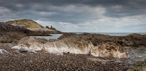 Mumbles Beach And Lighthouse Stock Image Image Of Pink Cloud 98509679