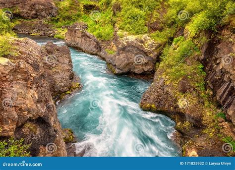 Water Of Hvita River Is Flowing Through The Lava Rocky Canyon Amazing