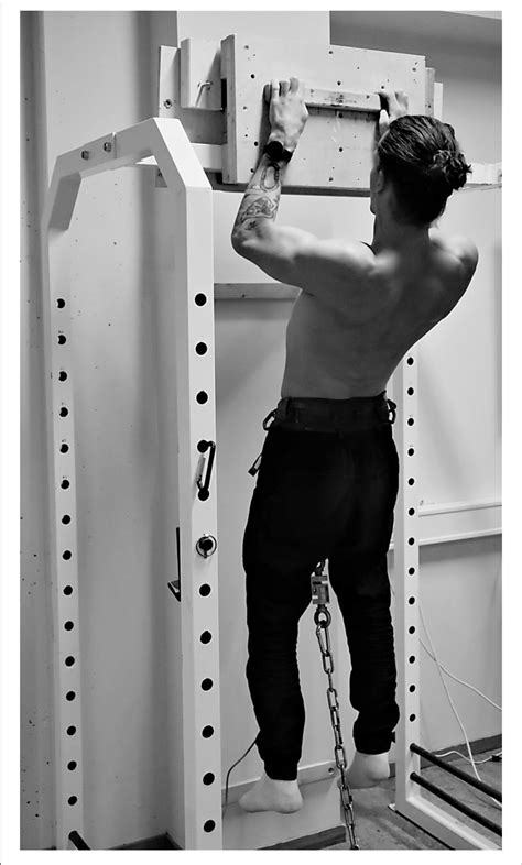 Image Showing A Participant Performing The Isometric Pull Up Test