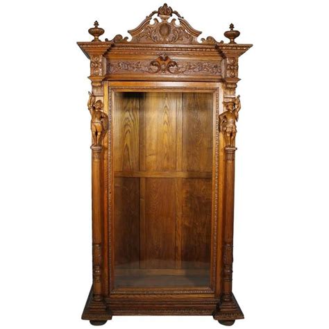 Italian 19th Century Baroque Style Carved Oak Figural Vitrine Cabinet