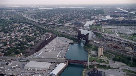 5k Stock Footage Aerial Video Following Calumet River Toward The High Bridge And Chicago Skyway