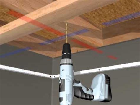 Install support wires hanging from the joist or rafters above the ceiling. HG Grid Suspended Ceiling Installation - YouTube