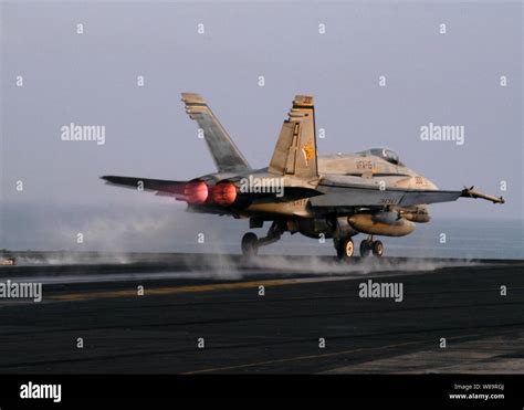 The Afterburners Glow On A Us Navy Fa 18 Hornet As It Launches From