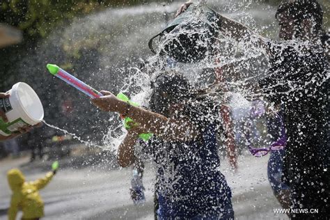 People Enjoy Splash Of Water During Flash Mob Water Fight In Vancouver