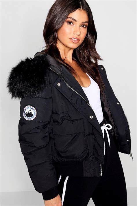 sale womens black puffer jacket with fur hood in stock