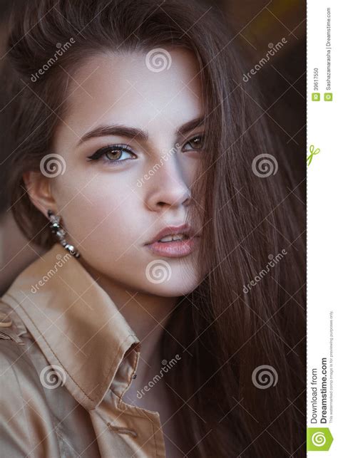 Portrait Of A Beautiful Young Woman In Casual Elegance