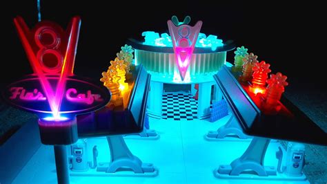 New Light Up Disney Pixar Cars Precision Series Flos V8 Café Play Set
